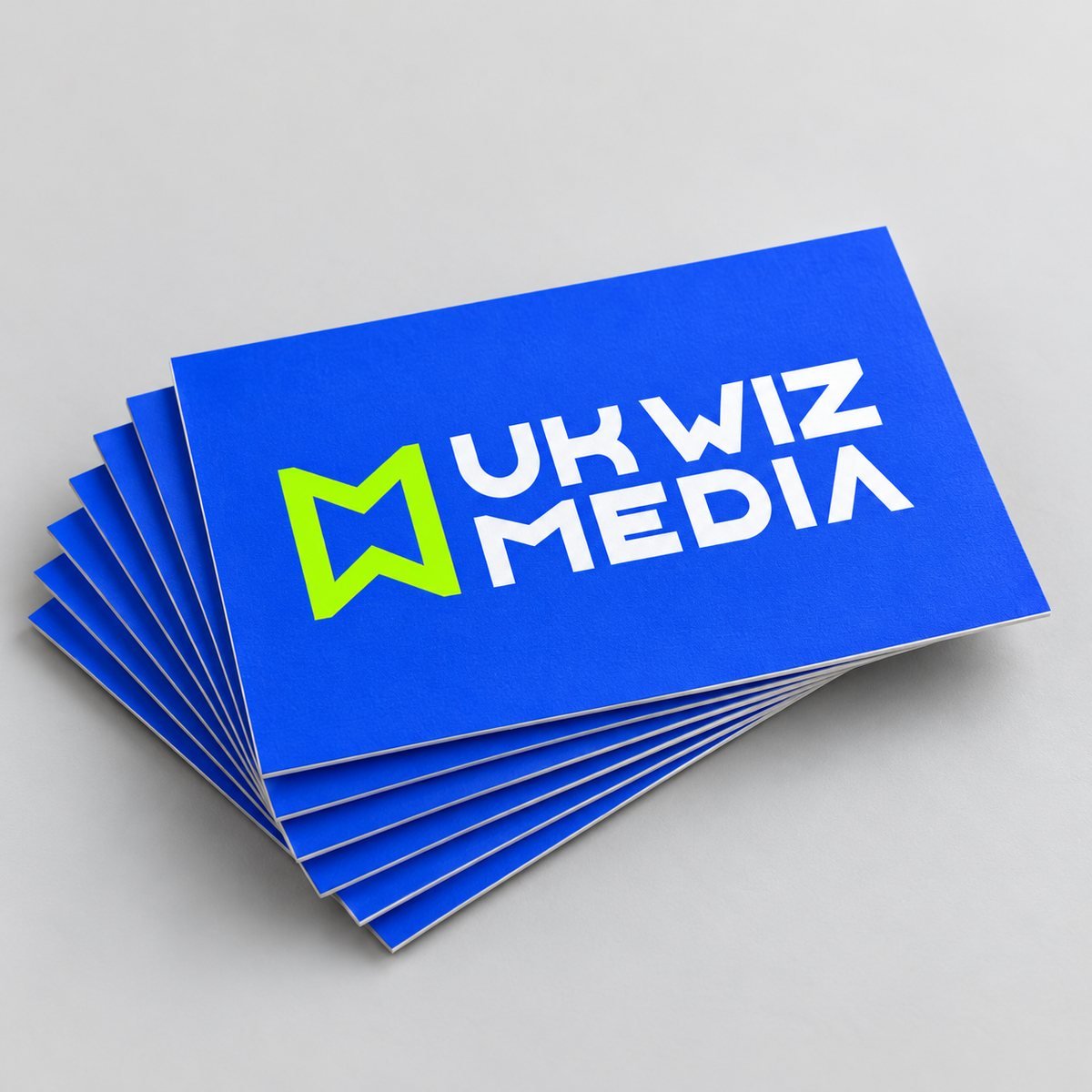 Business card printing Manchester – fanned stack of UK Wiz Media business cards